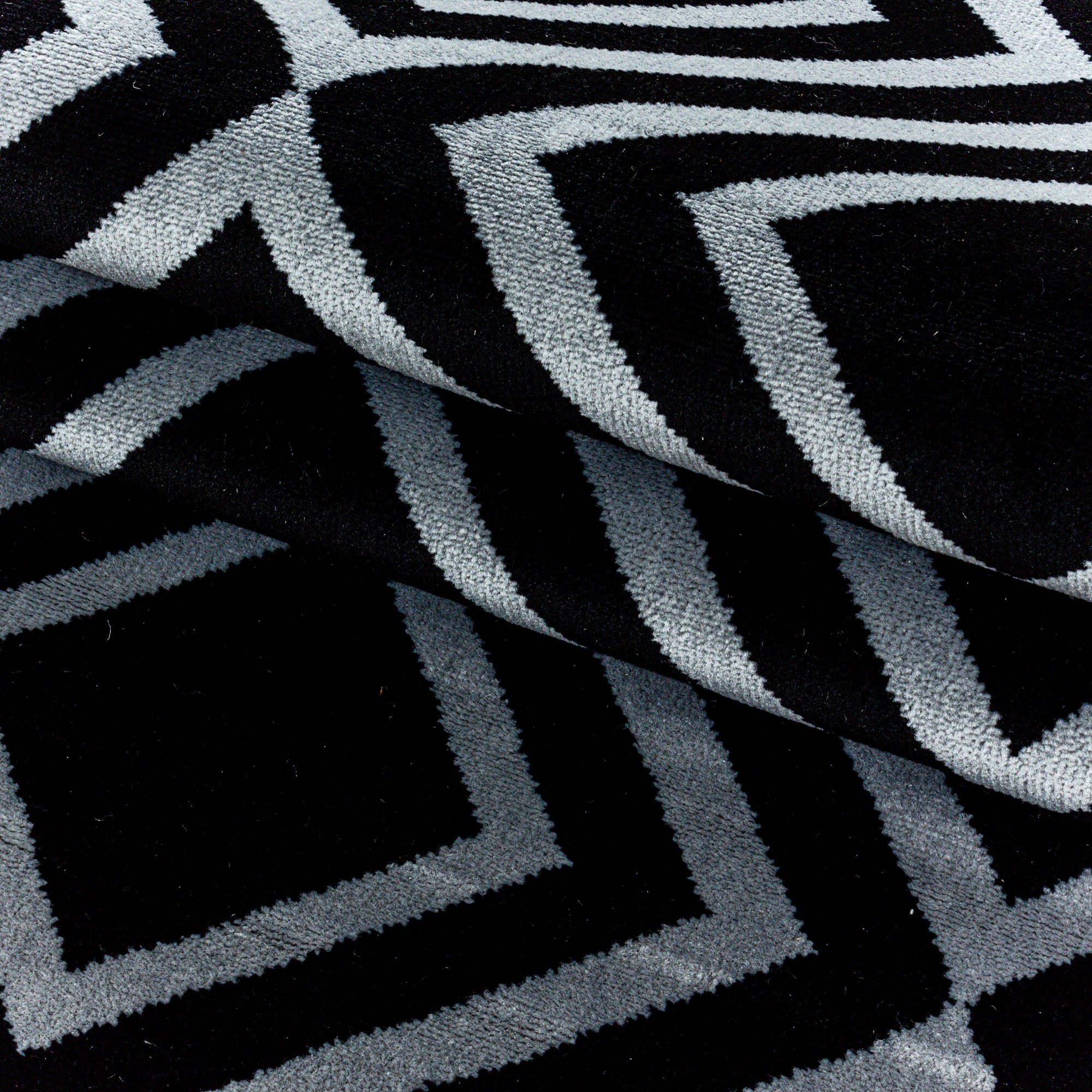 Geometric Repeating Diamond Pattern Rug - Black