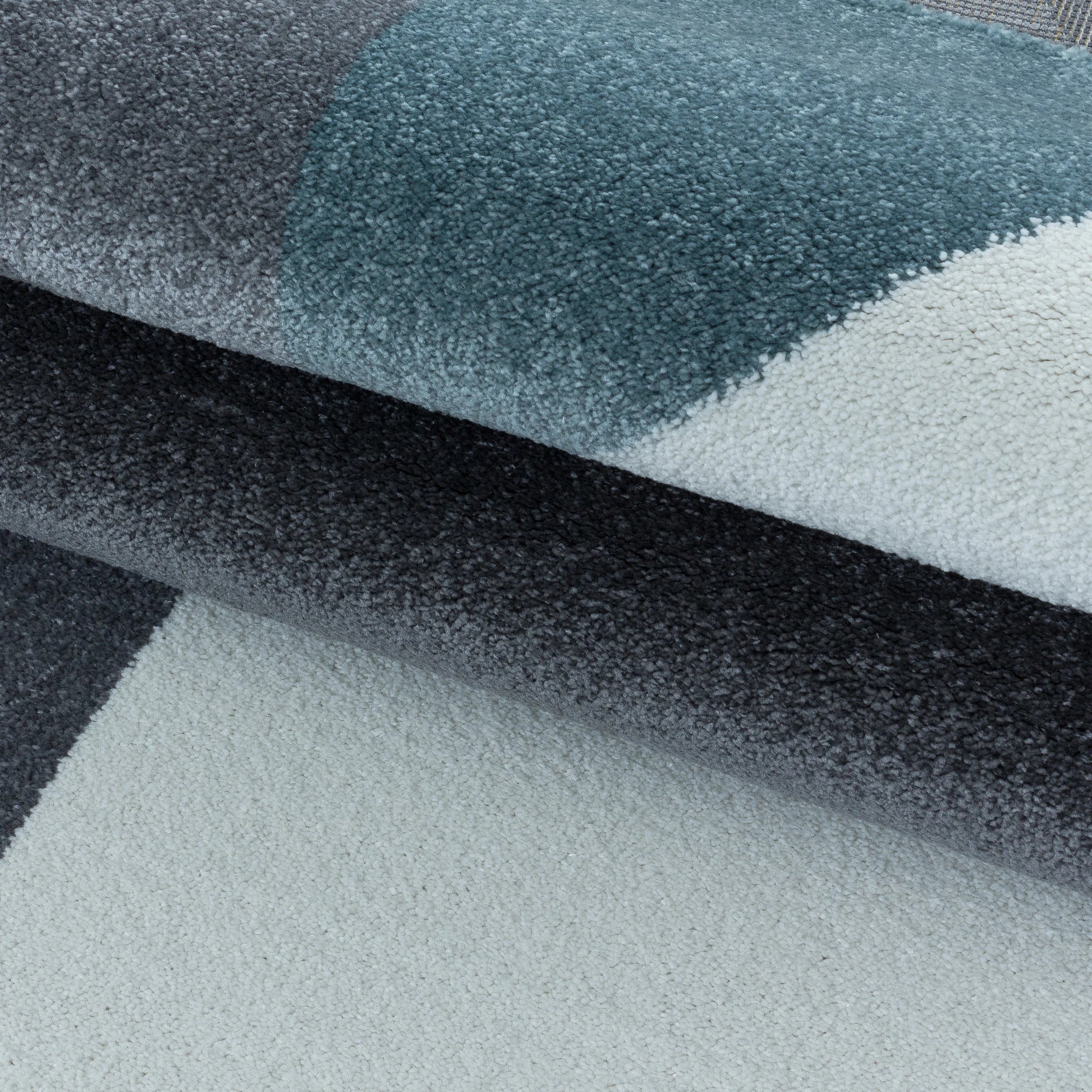 Modern Geometric Triangle Patchwork Area Rug | Blue