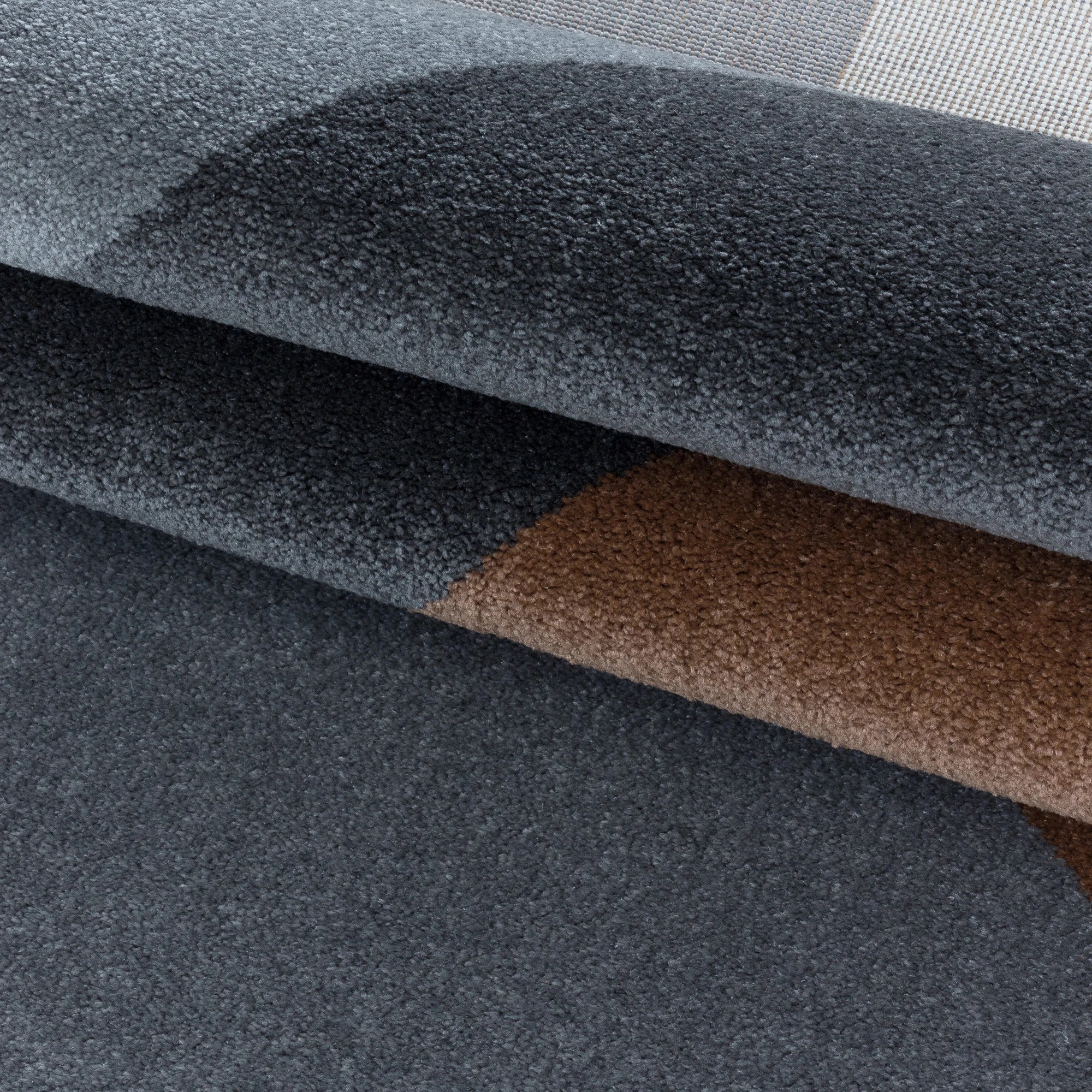 Modern Geometric Triangle Patchwork Area Rug | Copper