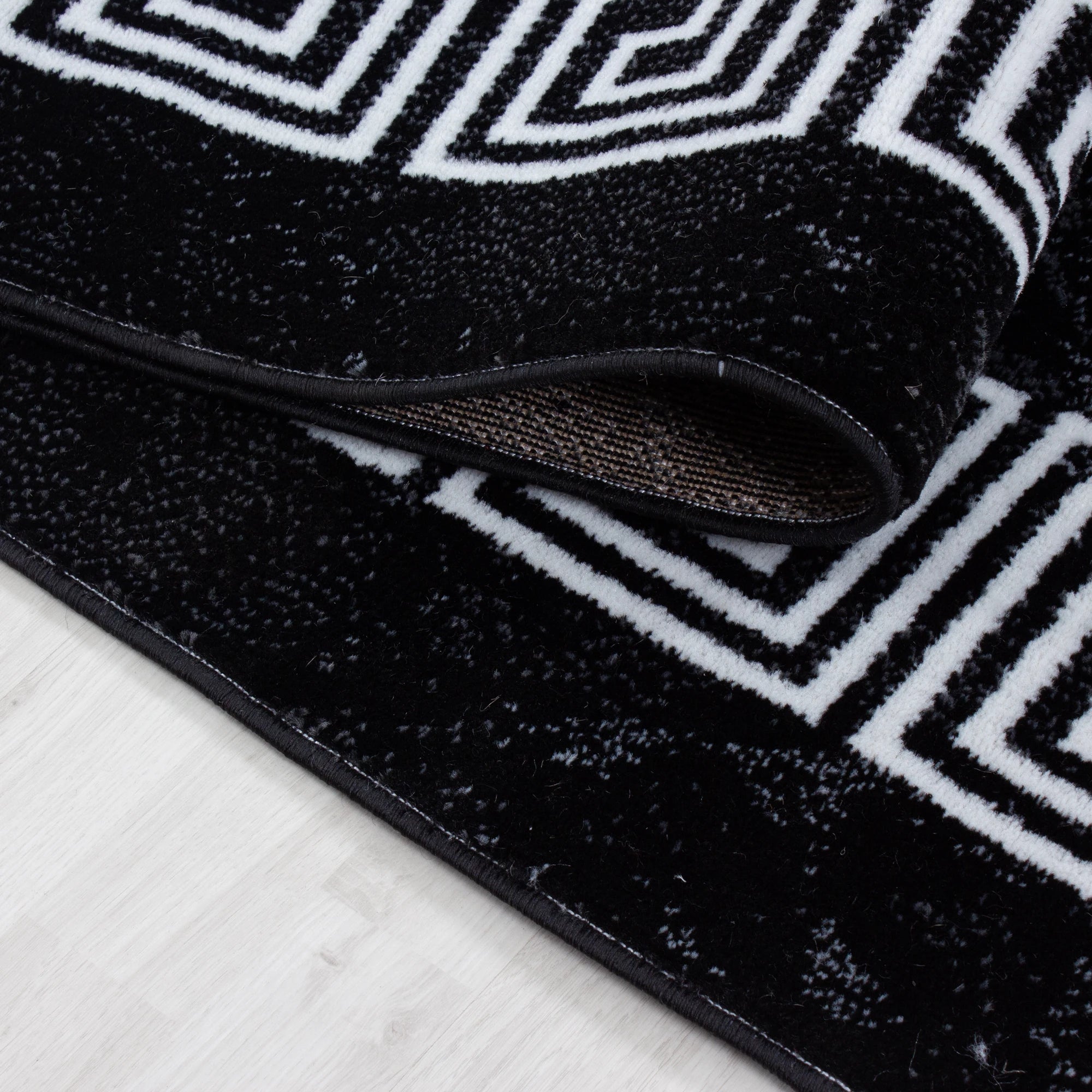 Modern Faux Marble Effect Border Carpet | Black