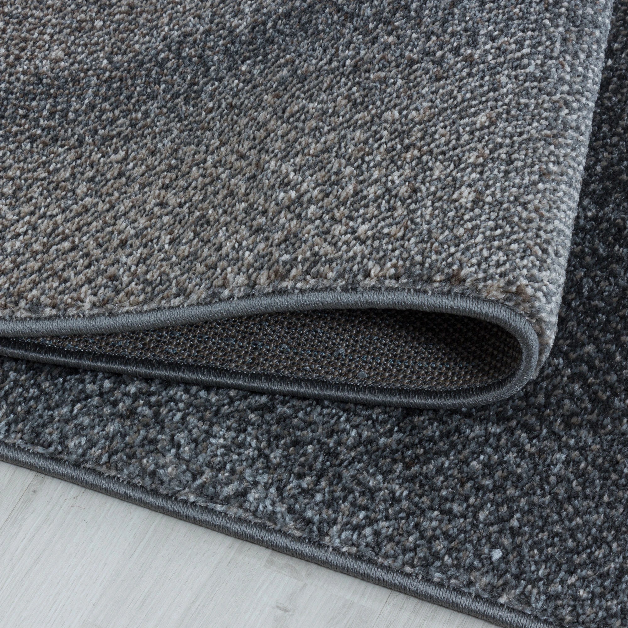Abstract Freeform Rug Brown