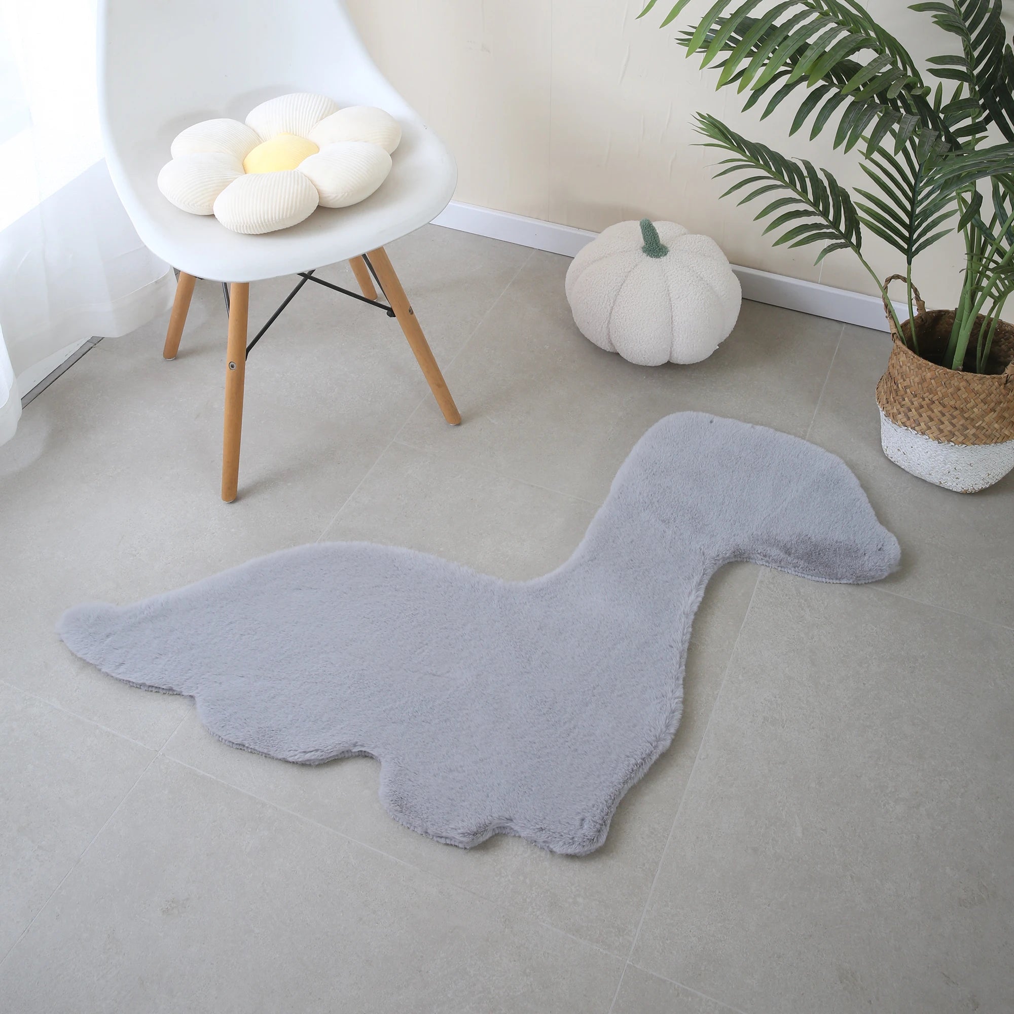 Schicker Teppich in Dino-Form