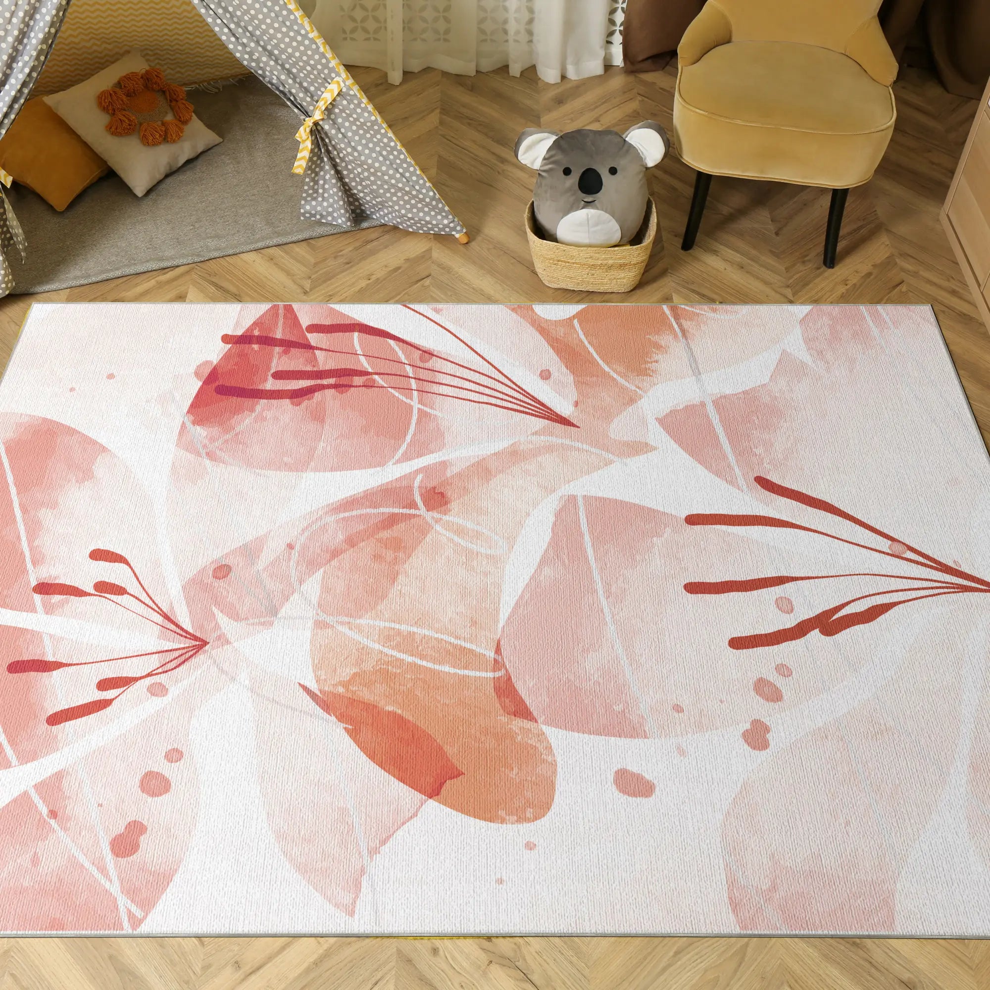 Floral patterned rug on a wooden floor with a child's play area in the background.