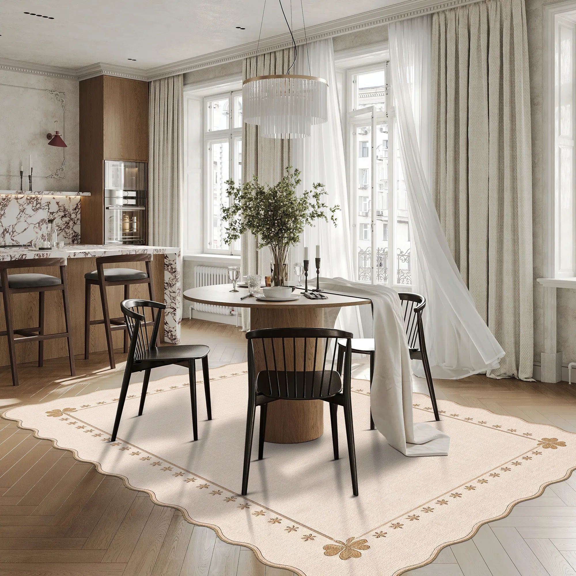 A large cream-colored patterned scalloped area rug with a styled interior scene showing a round dining table with black chairs in a bright, modern room with tall windows, sheer drapes, and a wood floor.