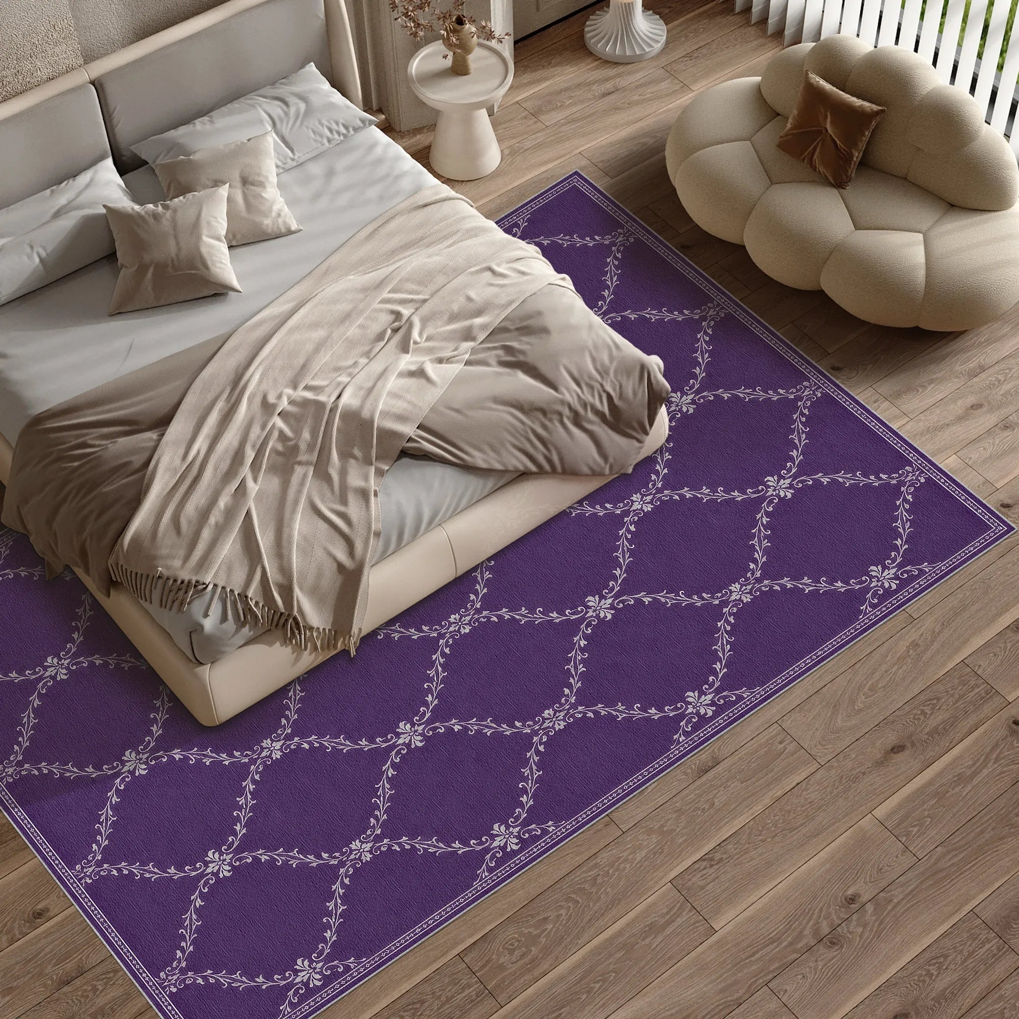 A purple lattice area rug with a white geometric lattice pattern, styled on a light wood floor in a modern bedroom setting next to a bed and a cloud-shaped pouf.