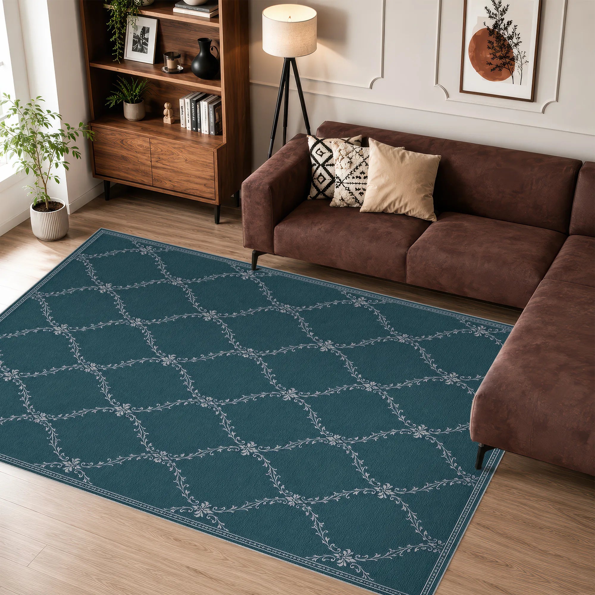 A teal blue lattice area rug with a white geometric lattice pattern is shown in a modern living room setting next to a brown sectional sofa and wooden bookshelf.