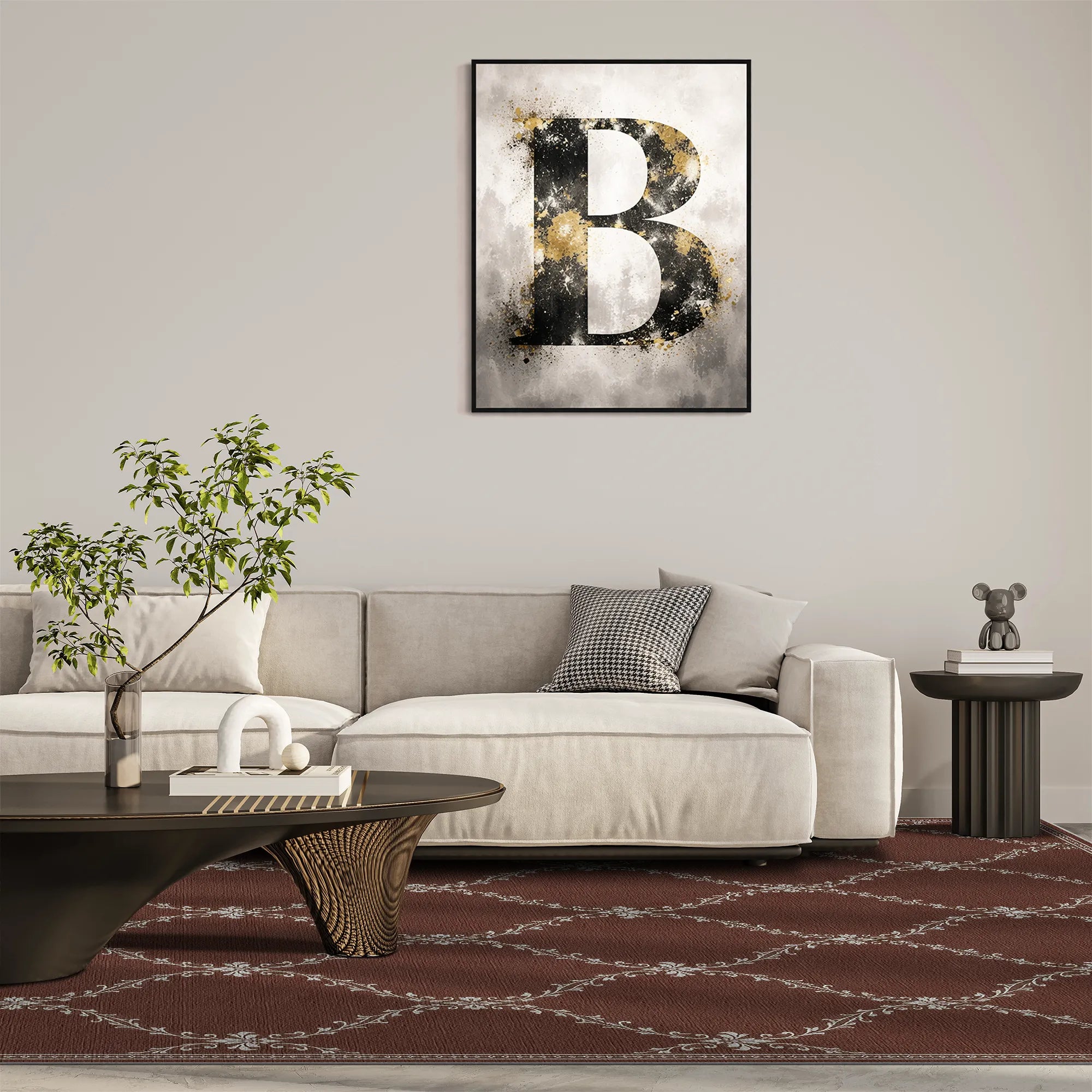 A lattice brown area rug with a framed abstract wall art print featuring a large textured letter B in black, white, and gold tones, displayed above a modern light beige sofa in a styled living room setting.