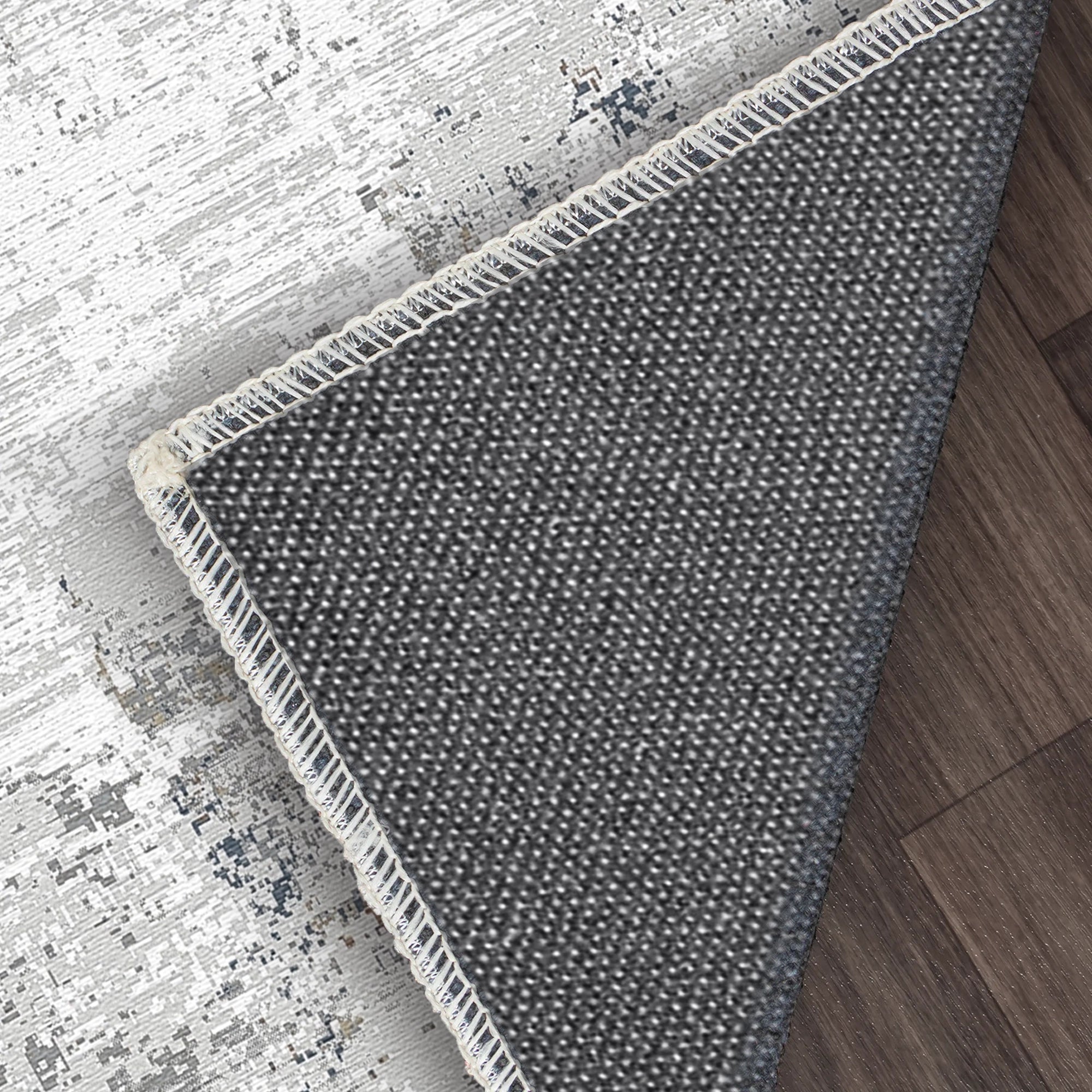 Abstrakter Teppich in Silber Schiefer Optik mit Used Look