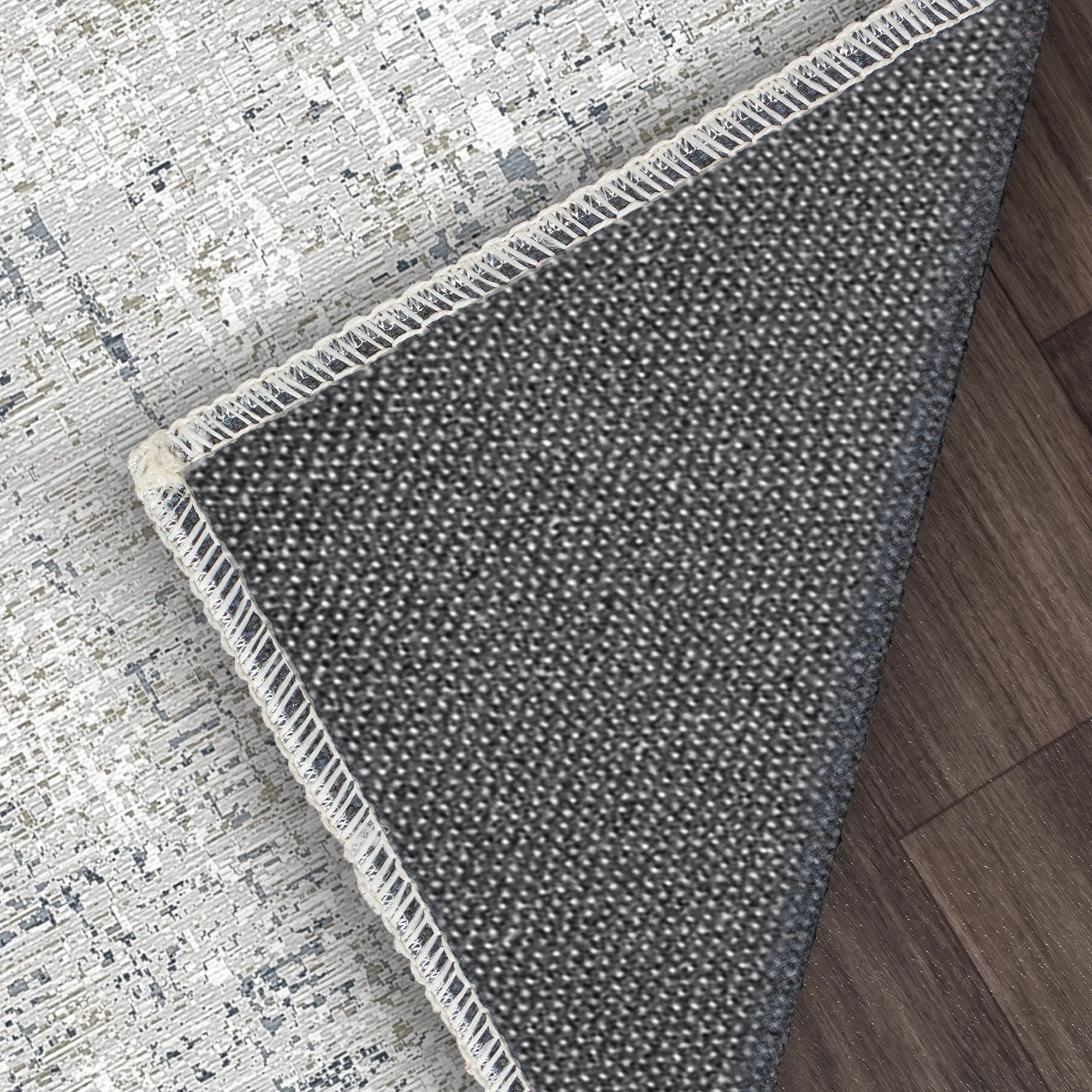 Waschbarer Teppich Himmlisches Gitter in Grau