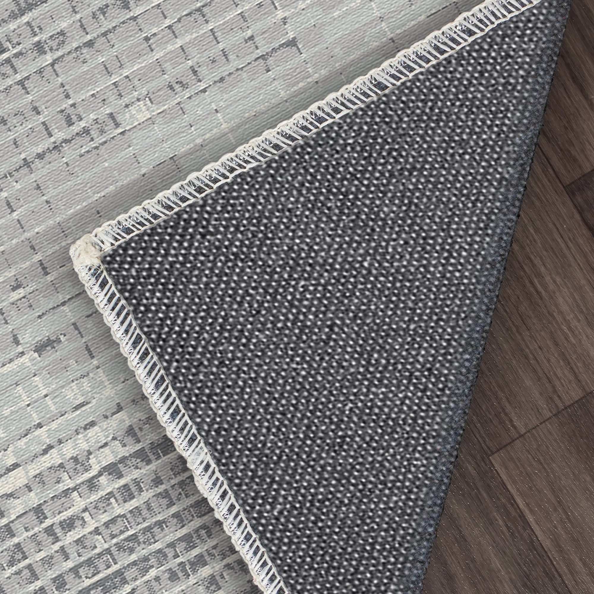 Abstrakter Teppich mit Graphitmatrix-Mosaik