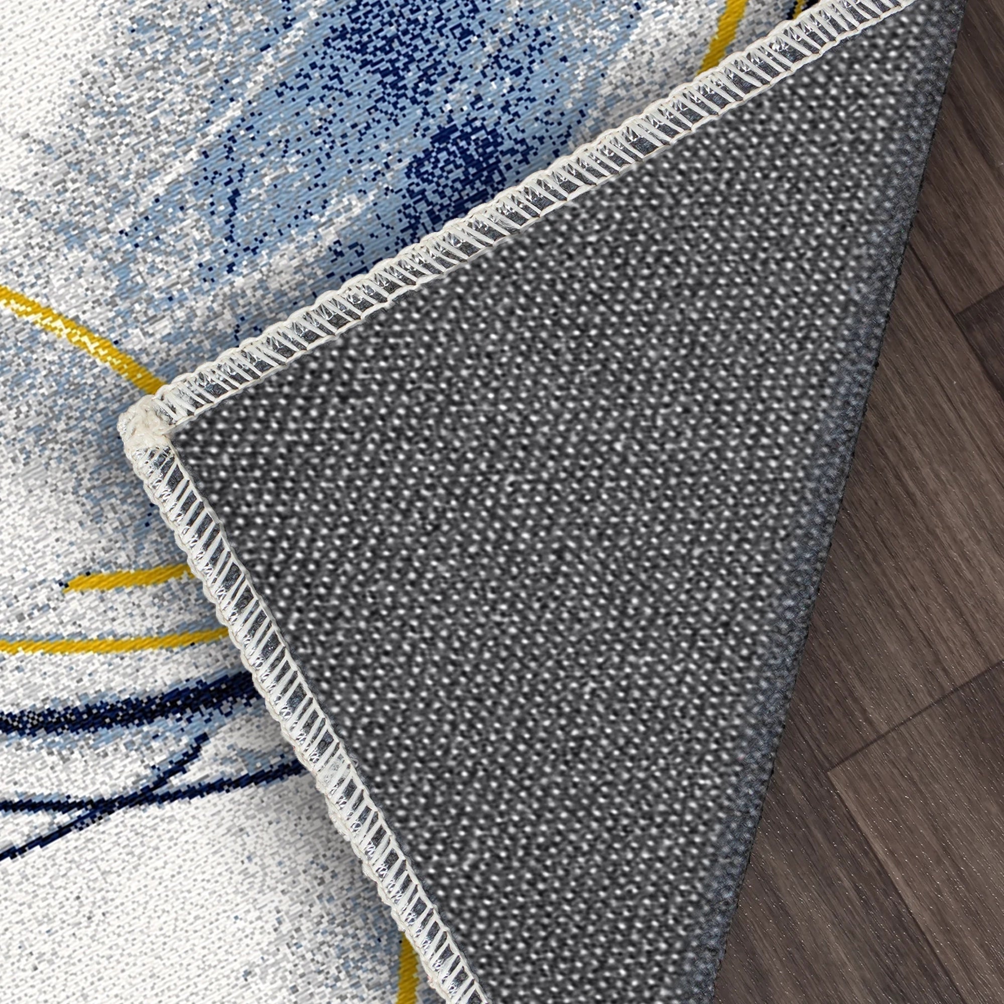 Abstrakter Teppich in Azurblau mit Orbit-Design